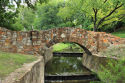 restored stone bridge at beautiful Reverchon Park, on Maple in Dallas